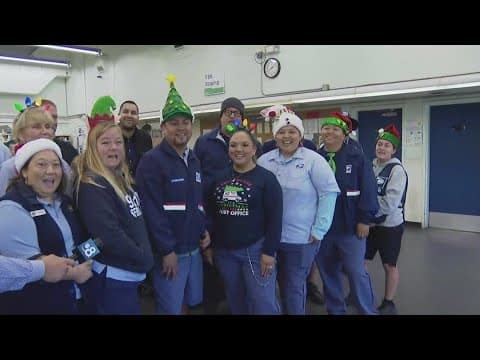 Santa's helpers at USPS in Serra Mesa prepare for the holiday season