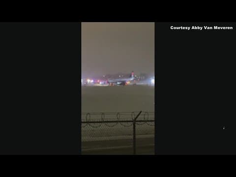 Plane slips off taxiway at MSP
