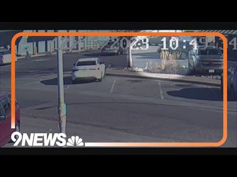 Video shows getaway vehicle being stolen while armed suspects rob business