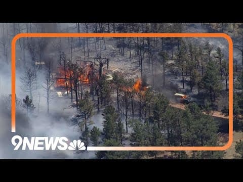 RAW: Helicopter video appears to show wildfire burning home, vehicles north of Lyons
