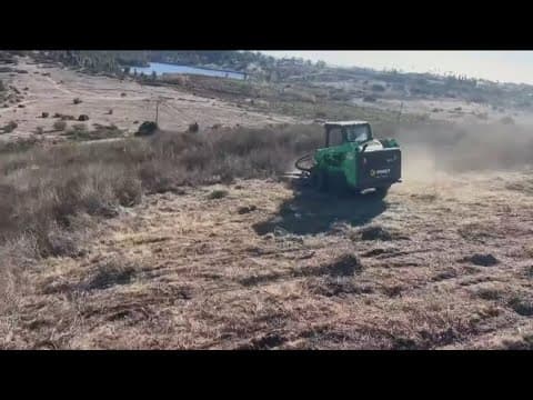 Neighbors create fire break to protect community from fire