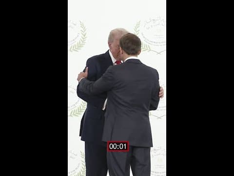 Watch Presidents Trump and Macron's 25-second handshake