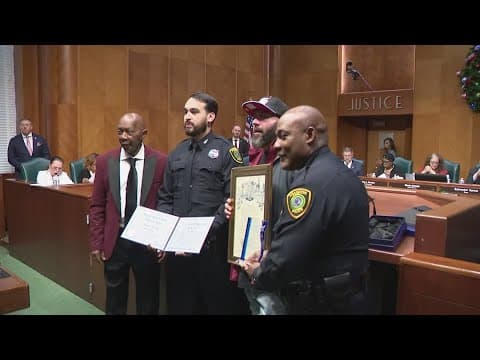 Man receives award for saving HPD officer shot on Southwest Freeway