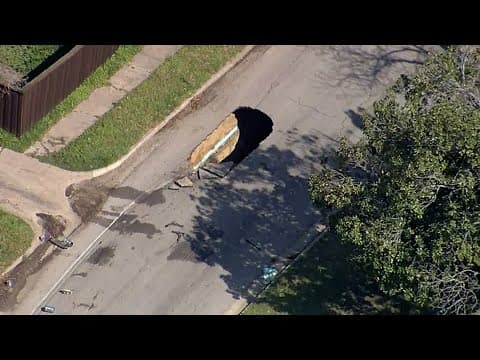 Large sinkhole opens in Dallas neighborhood