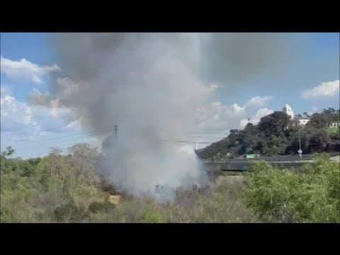 San Diego fire crews stop brush fire near I-8 and Morena Blvd