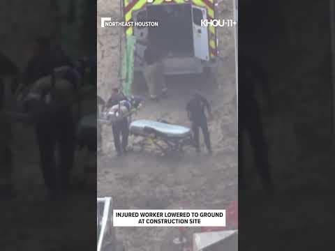 Injured construction worker lowered to ground