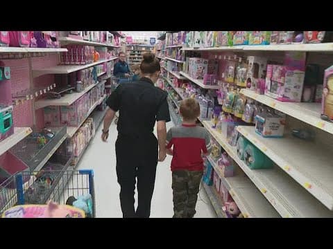 Newark police shop with children for Christmas during 'Cops and Kids' event