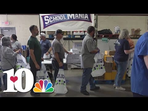 Volunteers pack bags for sixth annual School Mania event