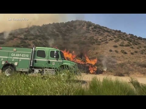 Wildfires and extreme heat stretch through the US