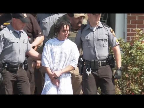 Escaped murderer caught in Pennsylvania leaves police barracks after arraignment