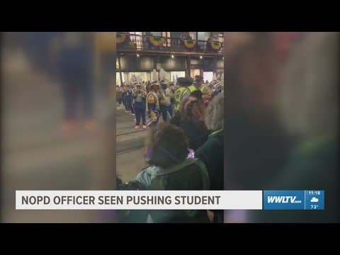 Officer removed from parade duty; mom wants apology after video shows push of band member