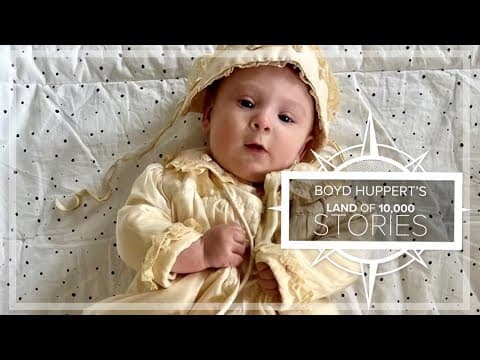 Family baptizes 27th baby in parachute silk that saved WWII airman's life