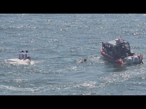 Coast Guard rescues 3 after boat capsizes near Sargent