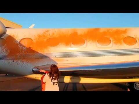 Climate activists paint planes in London orange, one day after doing the same to Stonehenge