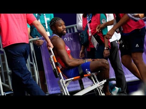 Noah Lyles 200m final: American sprinter carted off in wheelchair after receiving medical attention