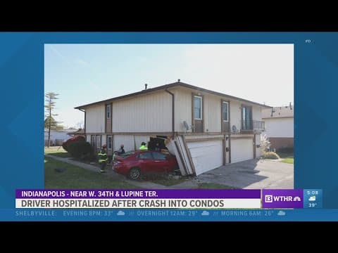 Driver hospitalized after crashing into condos
