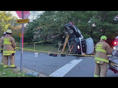 Two vehicle collision leaves one car off the ground, two injured