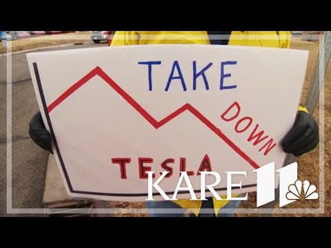 Protestors gather at Tesla dealership in Minnesota