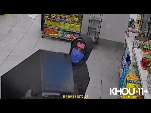 Caught on camera: Armed robber walks out of north Houston store carrying safe