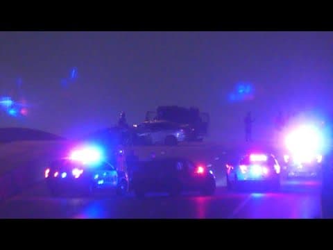 Raw video: Woman dies after slamming into back of F-350 truck, median on North Freeway, police say