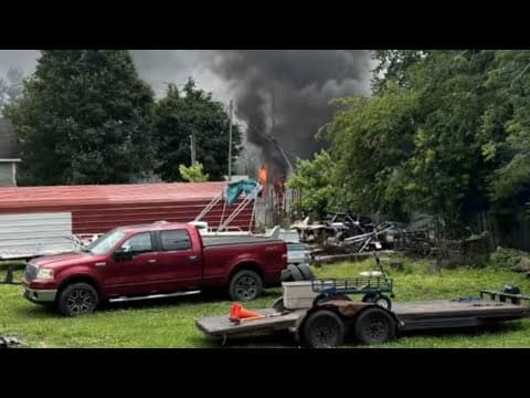 Woman faces neglect charges after 7-year-old son dies in Rush County fire