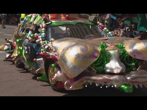 Creative cars on display in downtown Houston as art cars rolled through the street
