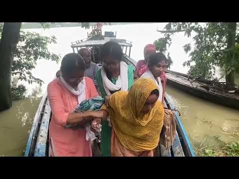 Indian mother delivers baby on boat as her river island is overwhelmed with floods