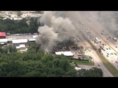 Junkyard fire sparks major traffic closure along North Freeway near Spring Cypress