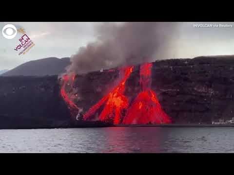 Lava from volcano in Spain flows into the ocean