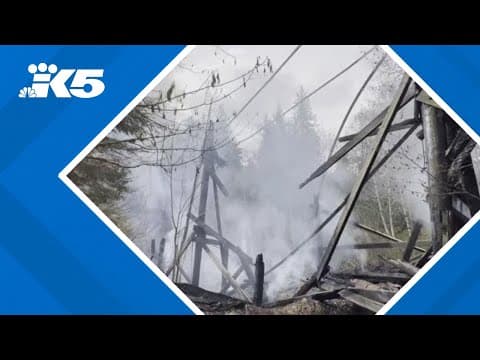 Fire continues to burn historic Washington state railroad bridge