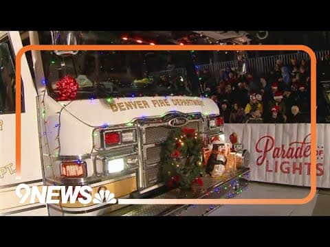Denver Fire Department's ladder truck rolls in Parade of Lights
