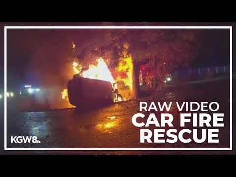 Raw video: Firefighters and police pull person from burning vehicle