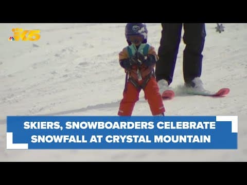Skiers and snowboarders celebrate new snowfall at Crystal Mountain