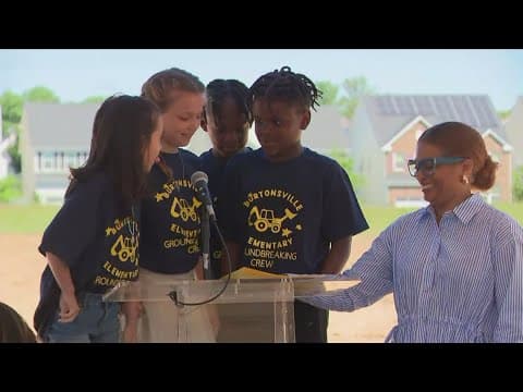 Marching band, cheerleaders help celebrate groundbreaking on new elementary school