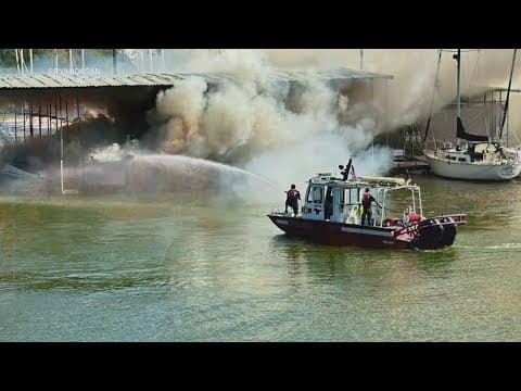 Officials are investigating an explosion that caused a fire in a Grapevine Marina