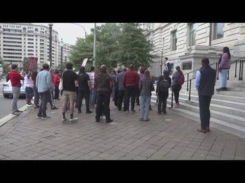 Expecting layoffs, transit workers protest outside DC council building