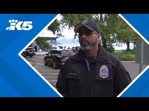 Seattle police work to apprehend suspect who fled into water after shooting at officer