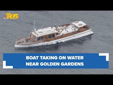 Boat taking on water near Golden Gardens