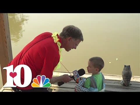 Todd talks to little boy while he's fishing