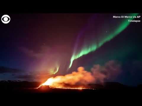 Timelapse video captures Northern Lights above erupting volcano in Iceland