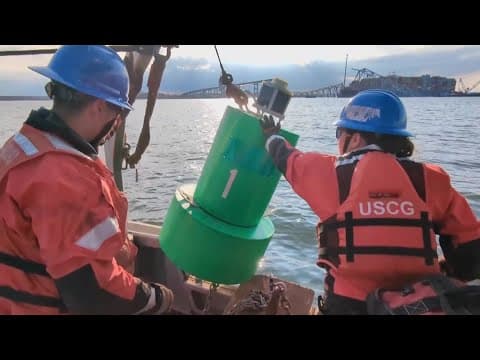 Temporary channel opens as crews continue to clear site of Baltimore bridge collapse