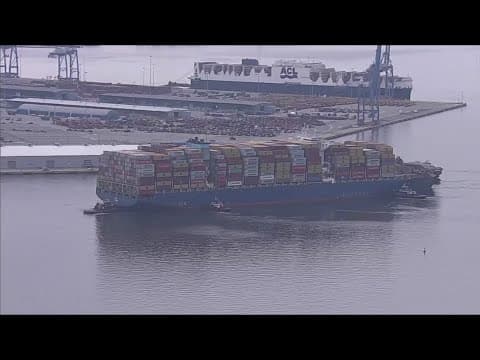 Crew members still on Dali cargo ship after bridge collapse