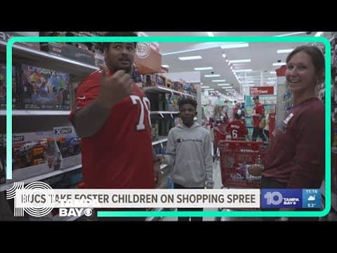 Bucs players take foster children on shopping spree