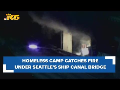 Homeless encampment on fire under Ship Canal Bridge