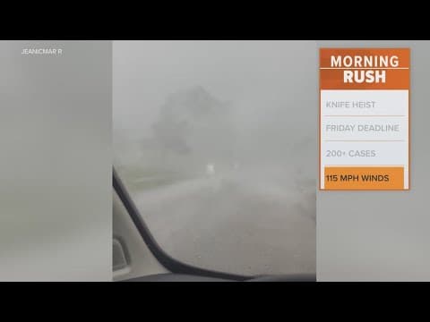 Video shows a woman waiting out a tornado in her car