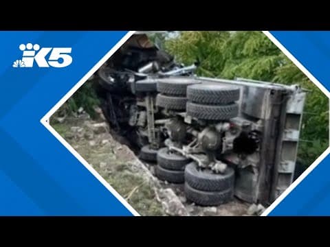 Dump truck plows into Edmonds home