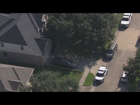 Person of interest in custody after body found inside Pearland home