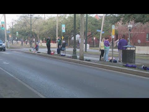 Paradegoers line up on St. Charles in New Orleans, how to recycle beads and throws