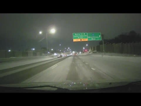 MnDOT crews work to clear snow from the roads Thursday morning