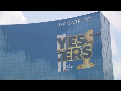 Downtown Indy street signs, JW Marriott graphics celebrate the Indiana Pacers